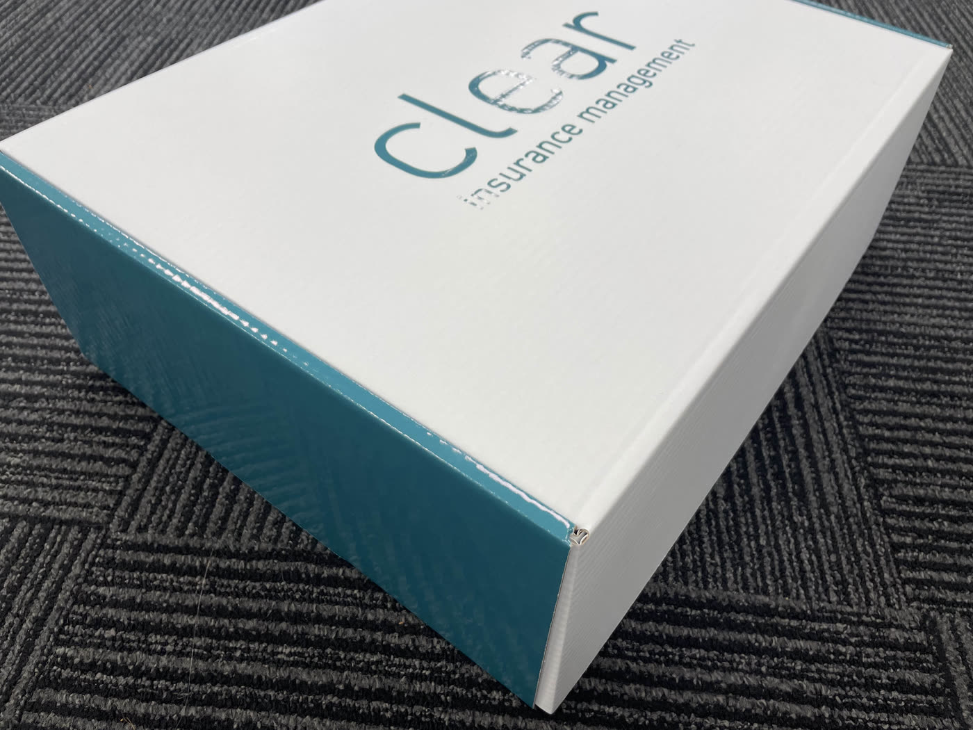 The same branded new-starter box shown from an angle