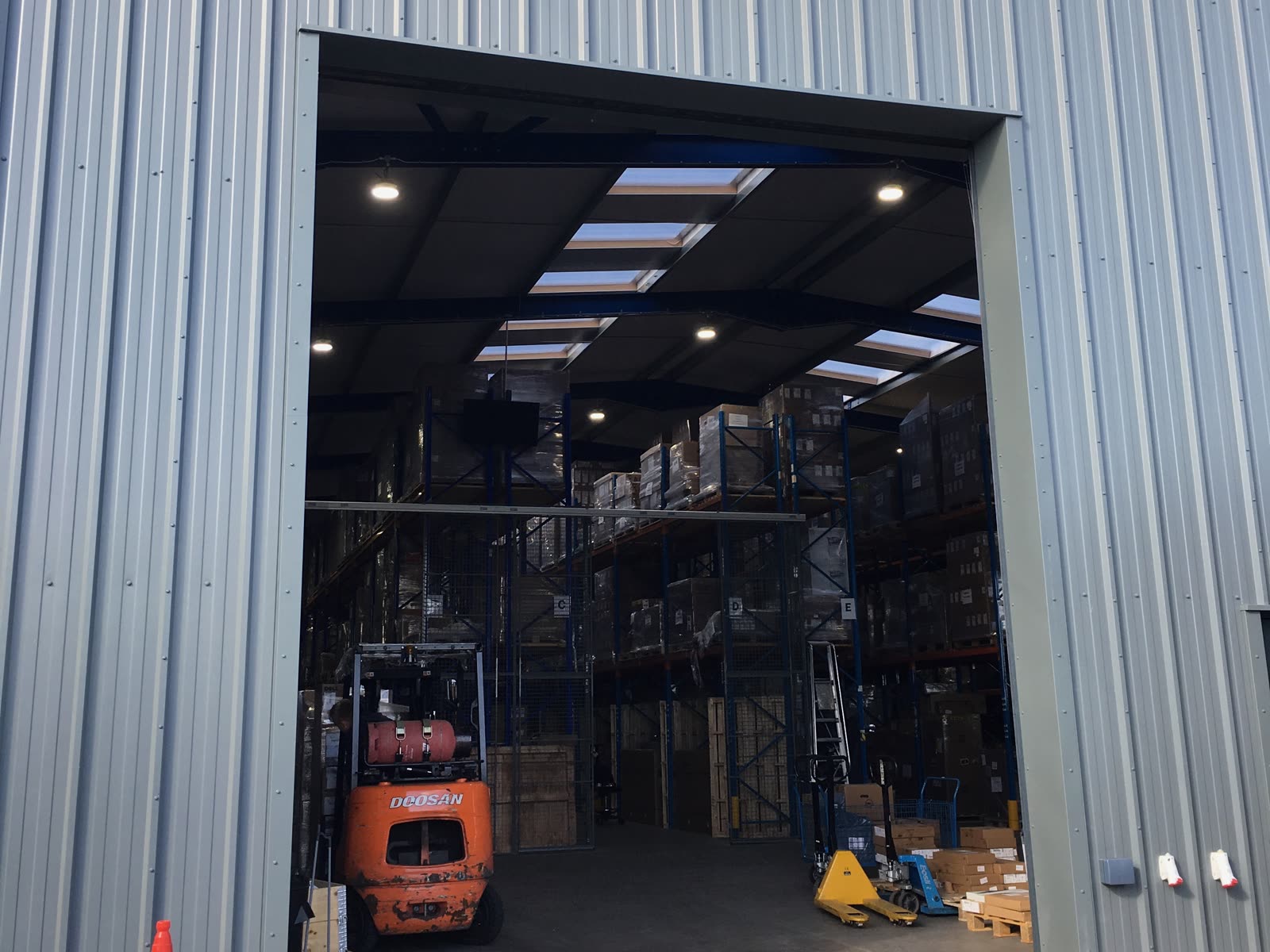 The Greensafe warehouse goods-in door, where returned and collected equipment arrives back at the hub