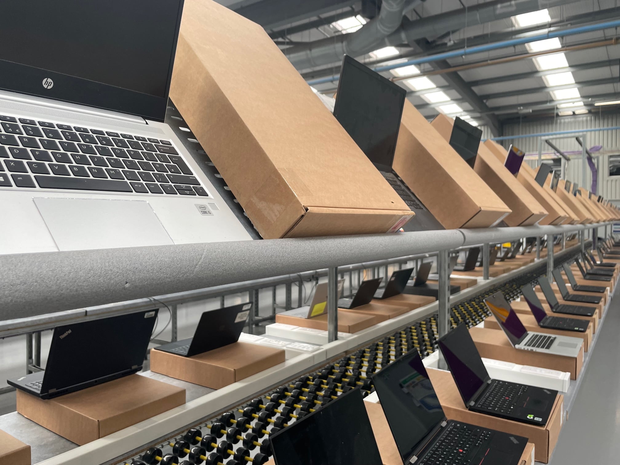Refurbished laptops and devices on the Greensafe refurbishment line